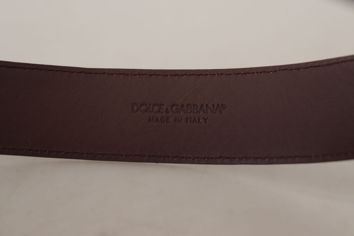 Elegant Maroon Leather Belt with Engraved Buckle